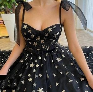 Teuta Matoshi size 14 Starry Aria dress in Black with silver and gold stars.